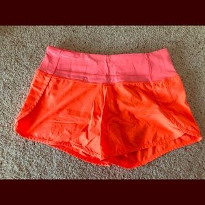 Bright pink lulu running shorts. Size 4